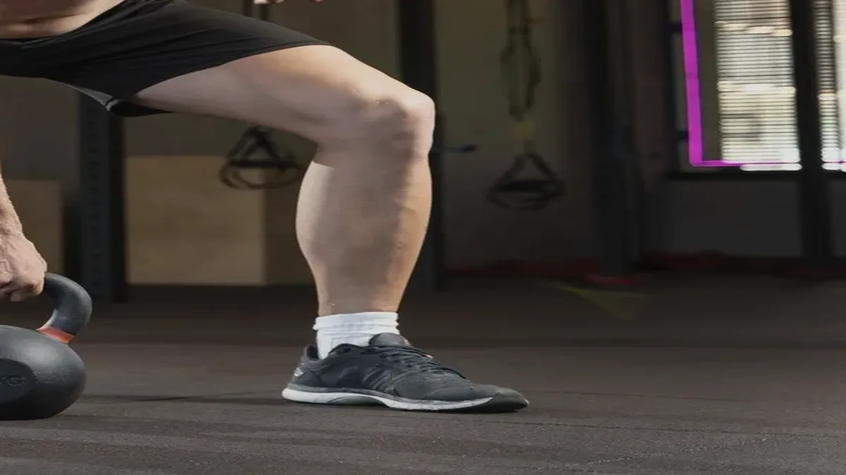 Muted training-floor photograph used as a calm confirmation banner backdrop